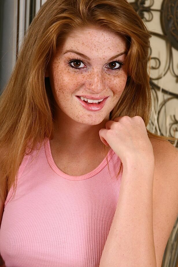16P Redhead hottie with freckled face uncovering her stunning curves
