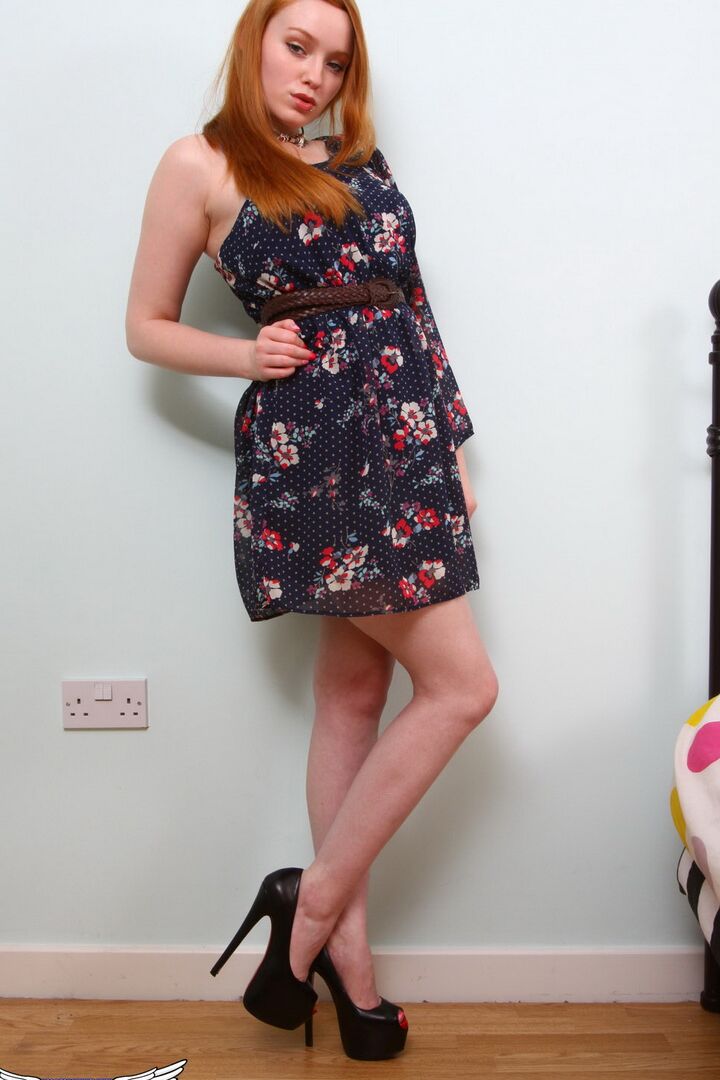 12P Natural redhead Kloe Kane shows some legs before getting naked on her bed