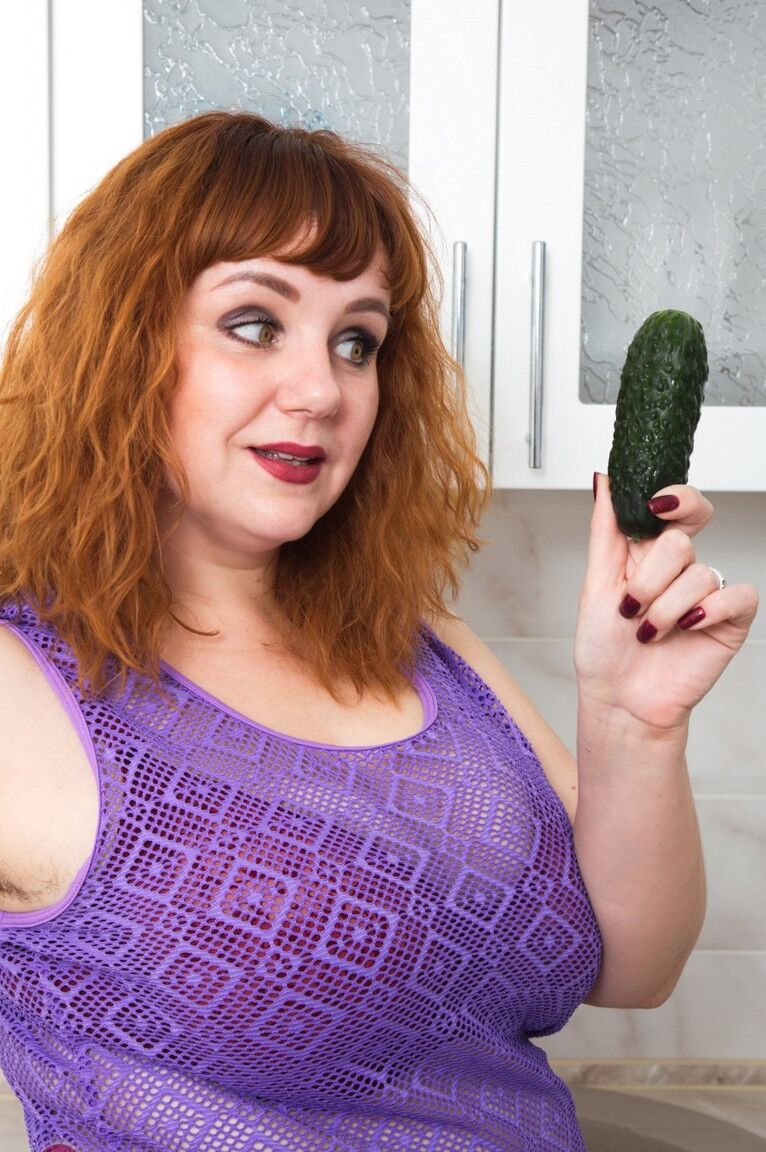 21P Chubby wife Katrin Porto plays with a cucumber after revealing her hairy twat