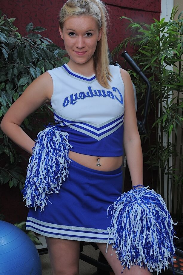 15P Amateur cheerleader Kristy Kay bares cameltoe and spreads pussy for close up