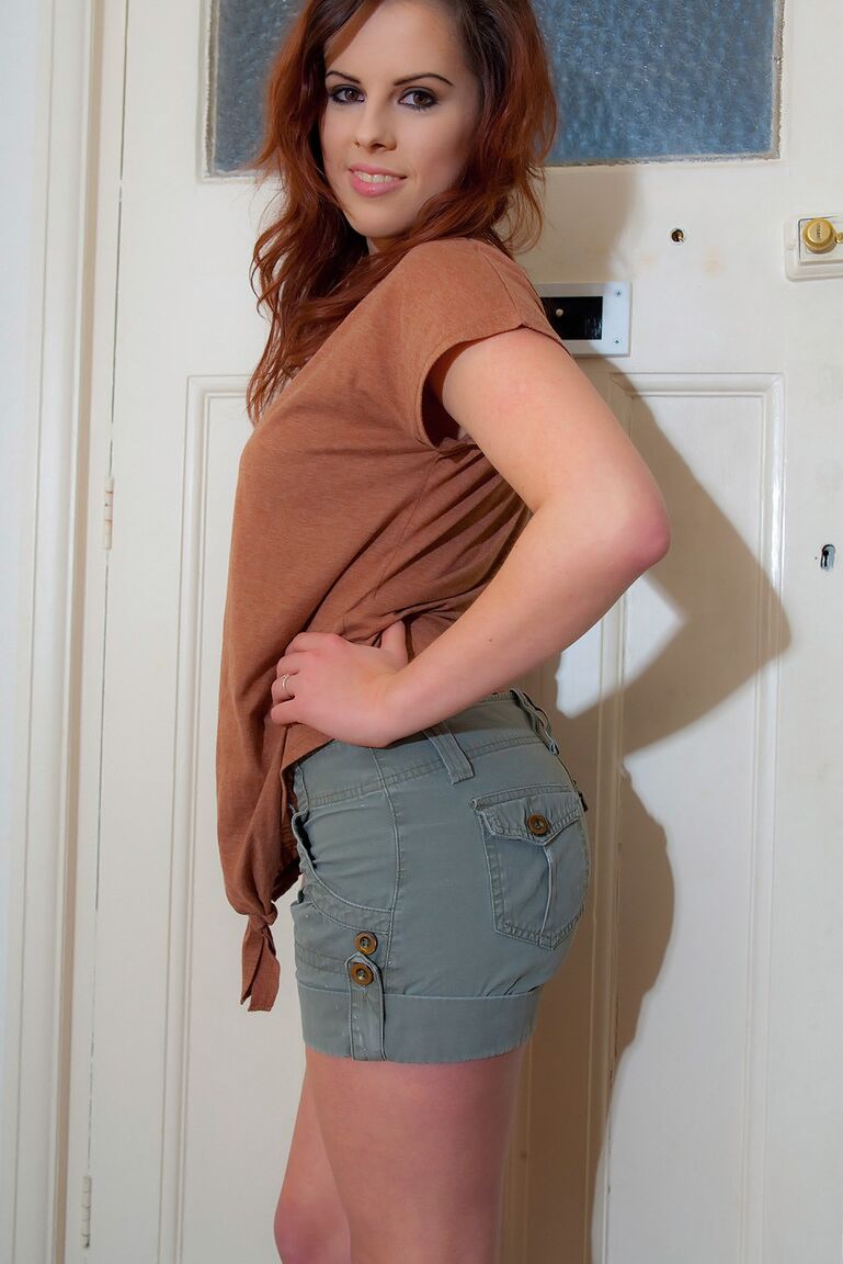 16P Sexy redhead Jocelyn slip off a thong after baring her beautiful breasts