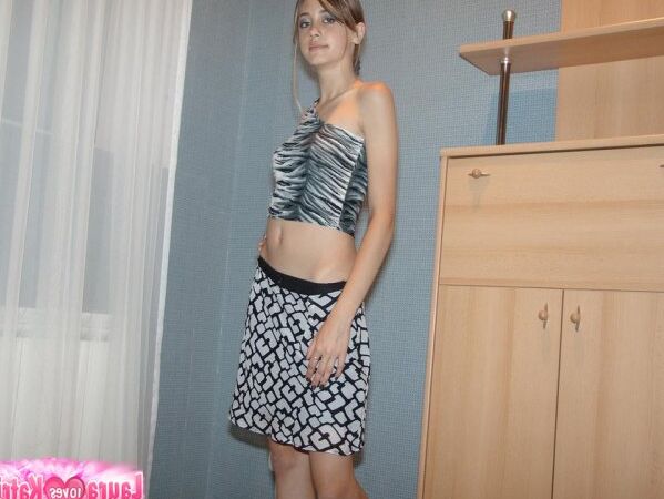 15P Thin teen strips naked before crawling on carpet flooring in solo action