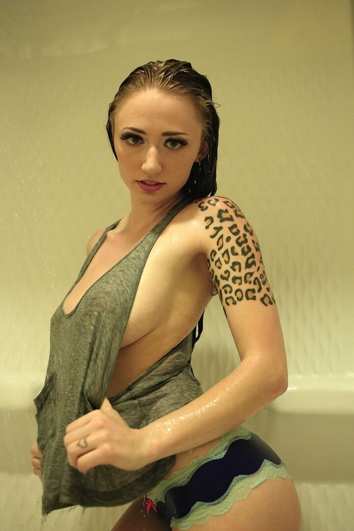 15P Tattooed girl Lily Xo gets naked while getting wet in the shower