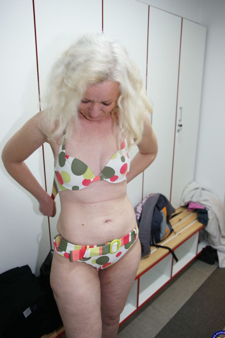 21P Mature women show their naked bodies while showering to get in the sauna