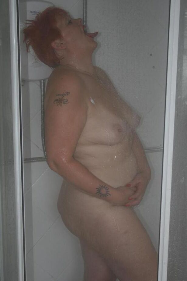 20P Mature redhead Valgasmic Exposed gets caught totally naked while in the shower