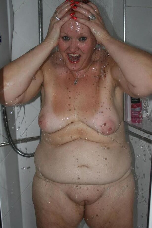 20P Mature redhead Valgasmic Exposed gets caught totally naked while in the shower
