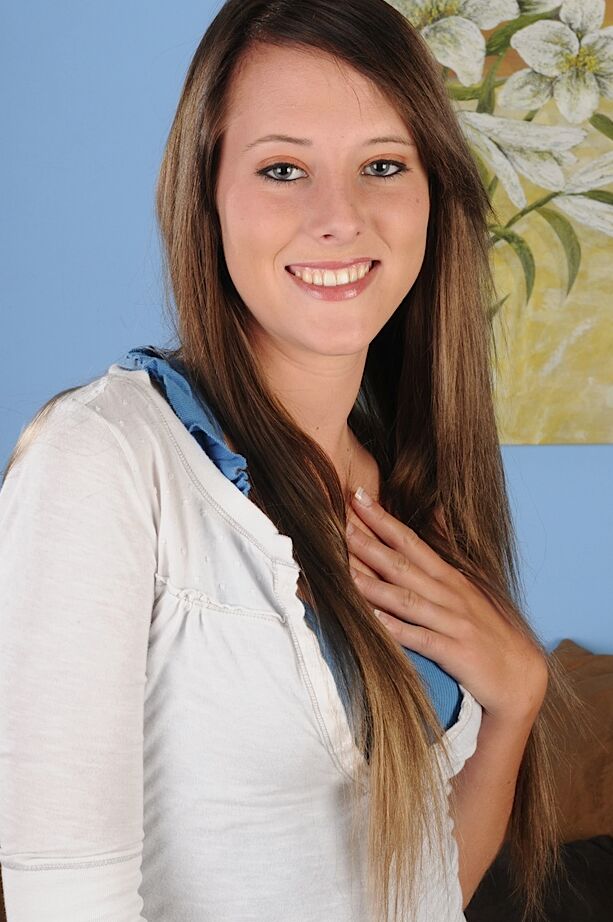 16P Smiley sweetie with shaved slit undressing and spreading her long legs