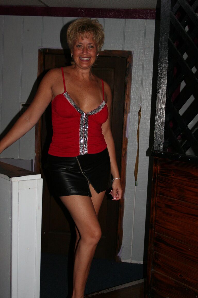 21P Slutty swinger wives French kiss and pose provocatively at a party