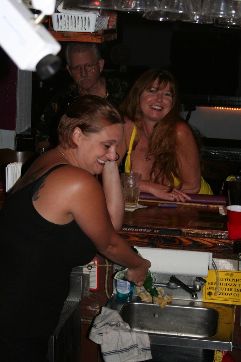 21P Slutty swinger wives French kiss and pose provocatively at a party