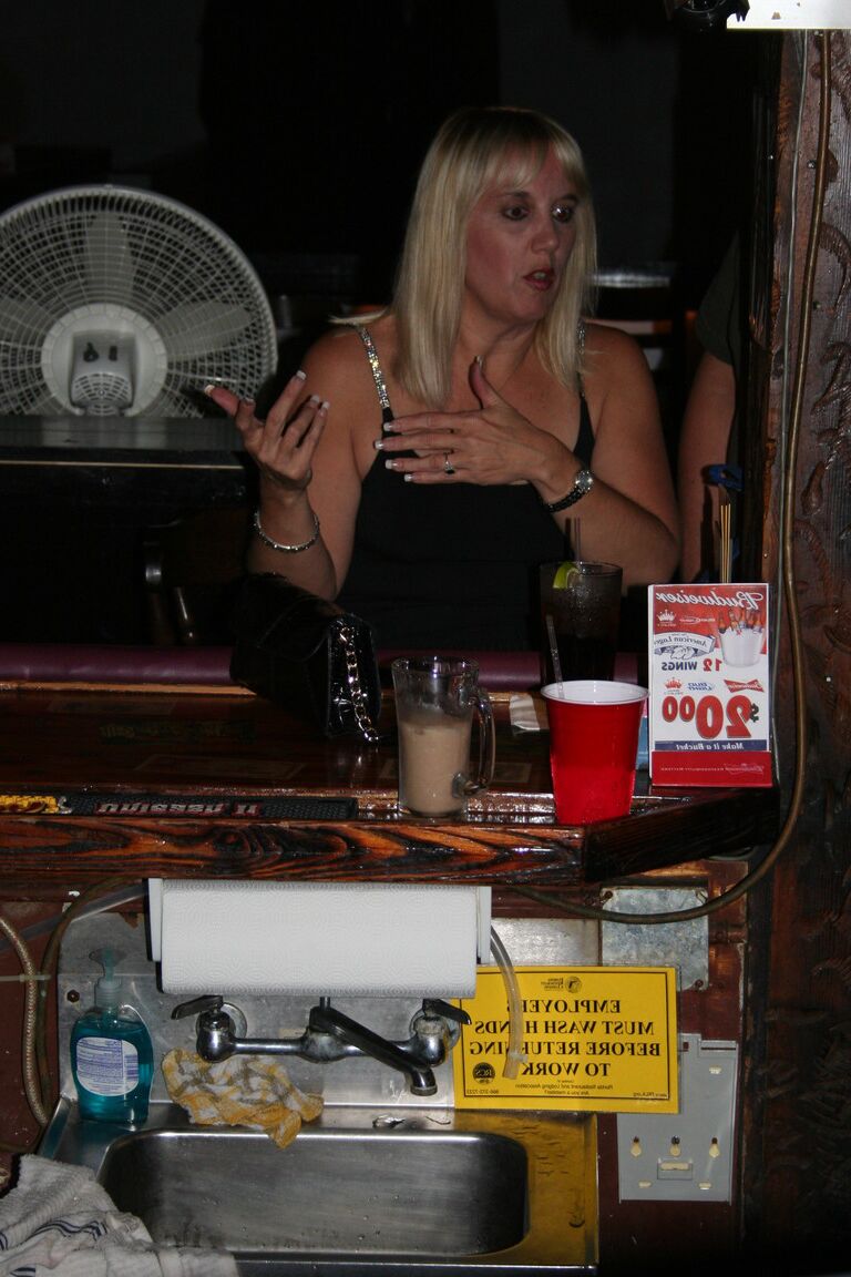 21P Slutty swinger wives French kiss and pose provocatively at a party