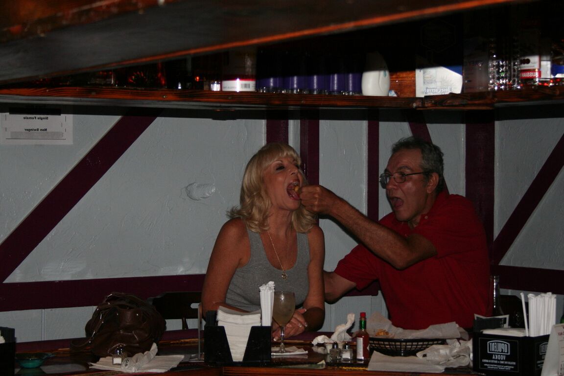 21P Slutty swinger wives French kiss and pose provocatively at a party