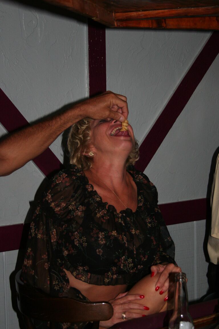 21P Slutty swinger wives French kiss and pose provocatively at a party
