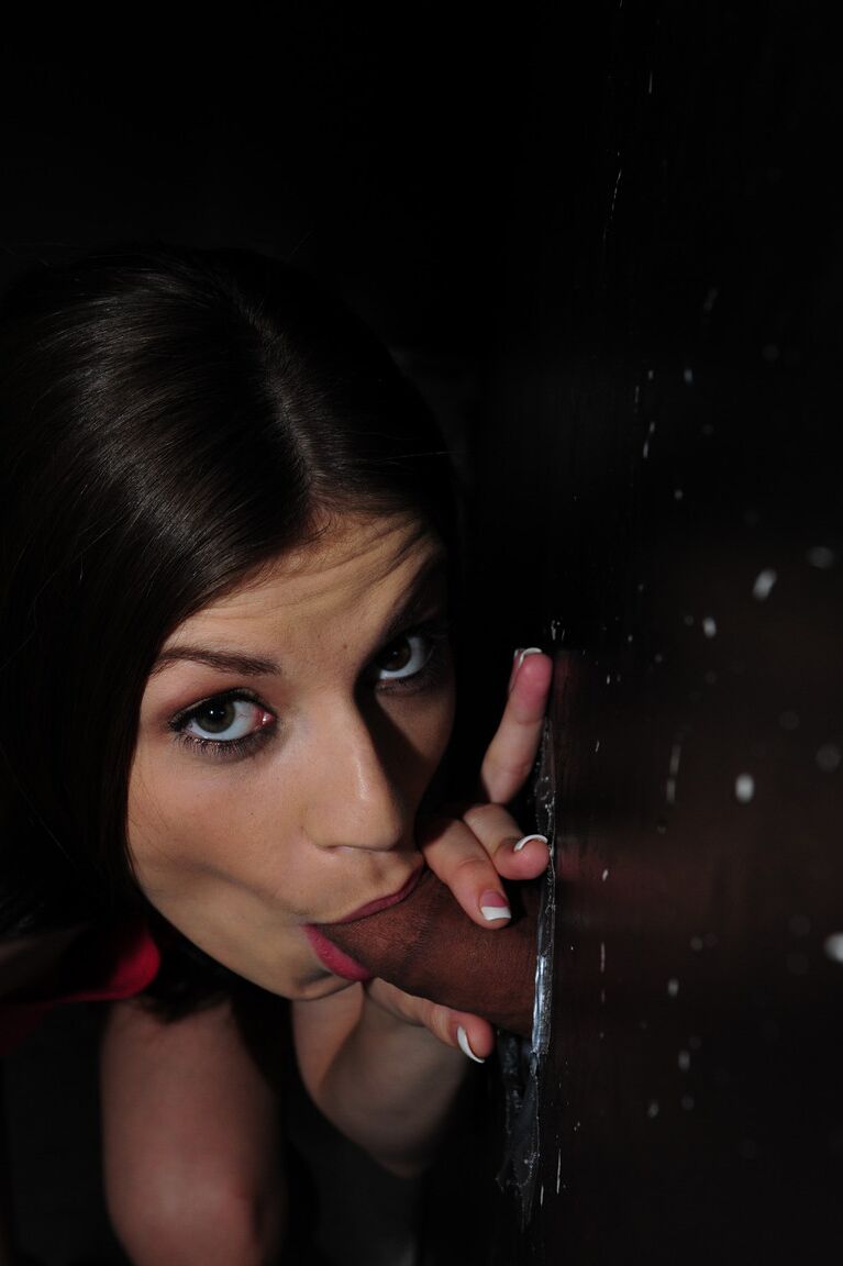21P Busty brunette Dillion Carter pleasures herself with a big cock at a gloryhole