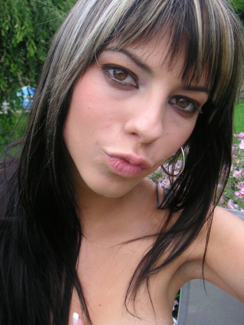 21P Cute babe with small tits Mellie Swan poses and flaunts her shaved vagina