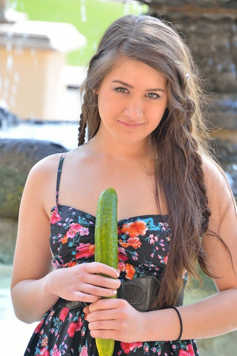 21P Cute brunette Shannon exposes her twat and slides a cucumber in it in public