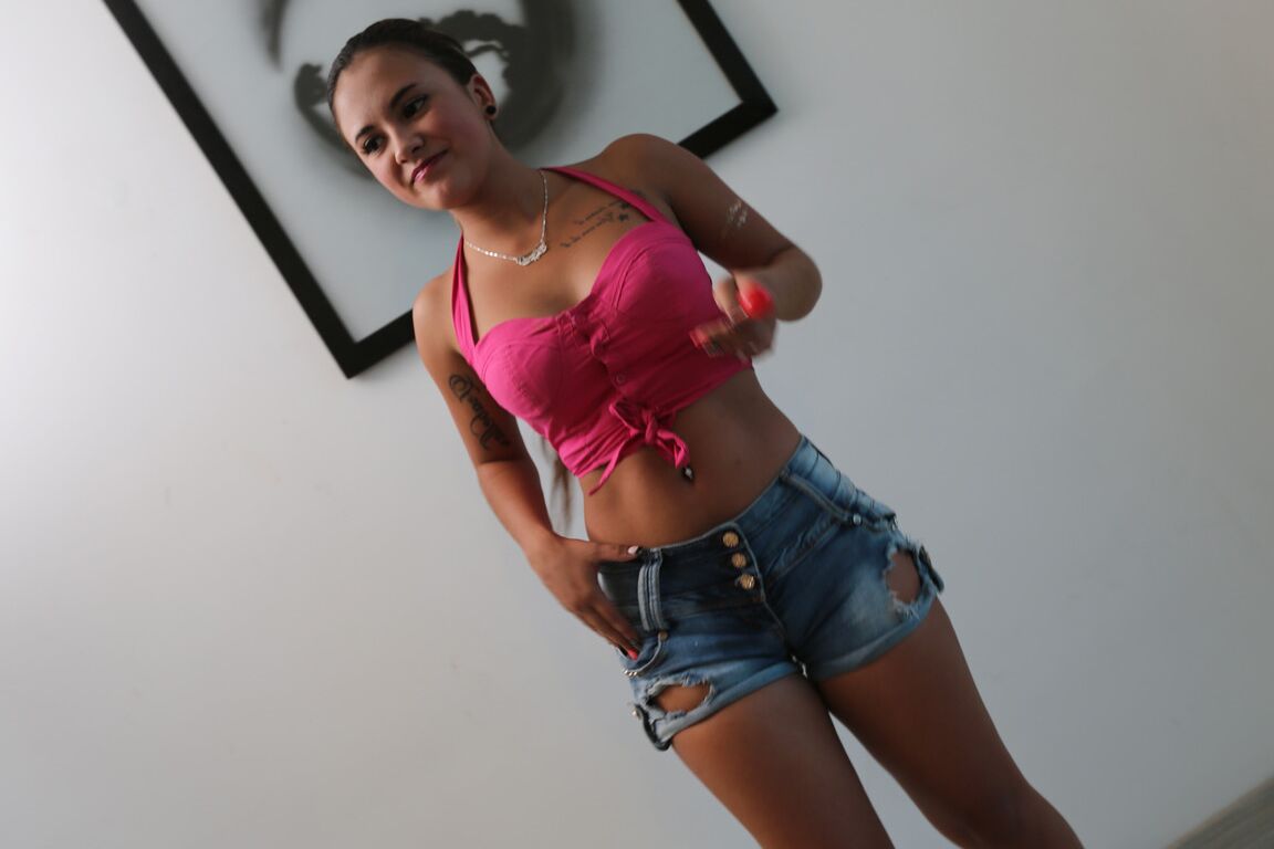 21P Latina newbie Sofia Perez undresses at the casting and shows her perky tits