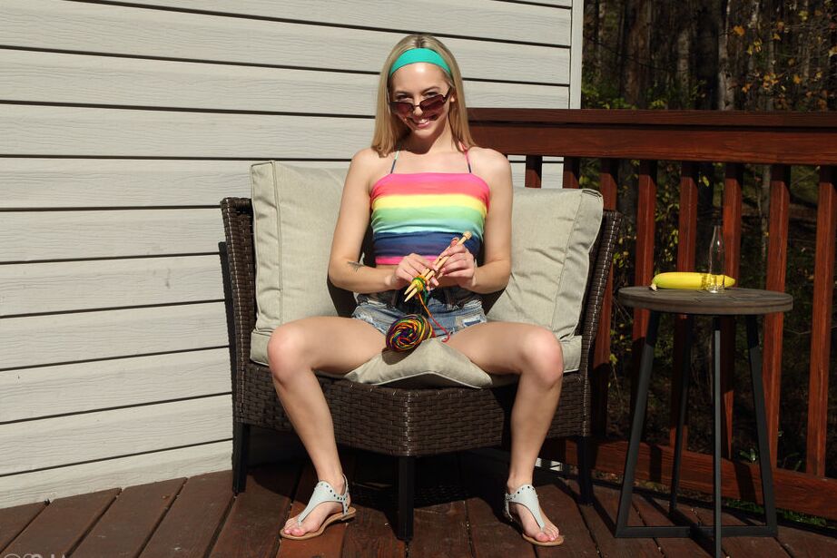 16P Blonde teen Lily Larimar eats a banana during vaginal insertions on a deck