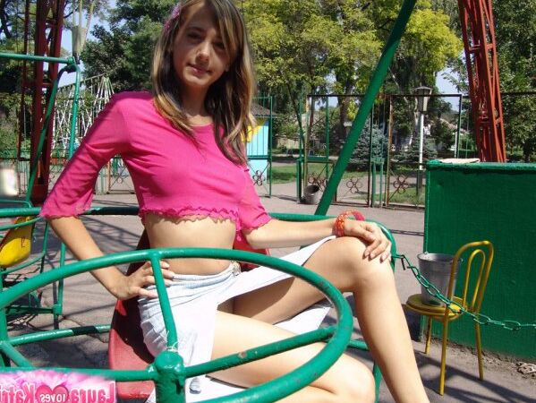 15P Busty teen flashing goodies in a merry go round