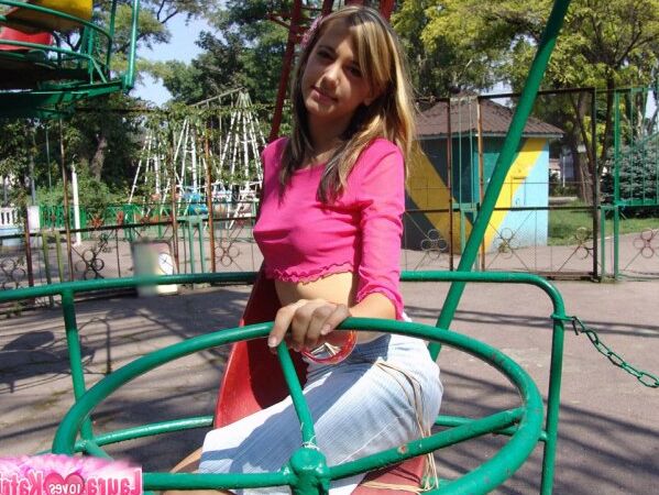 15P Busty teen flashing goodies in a merry go round