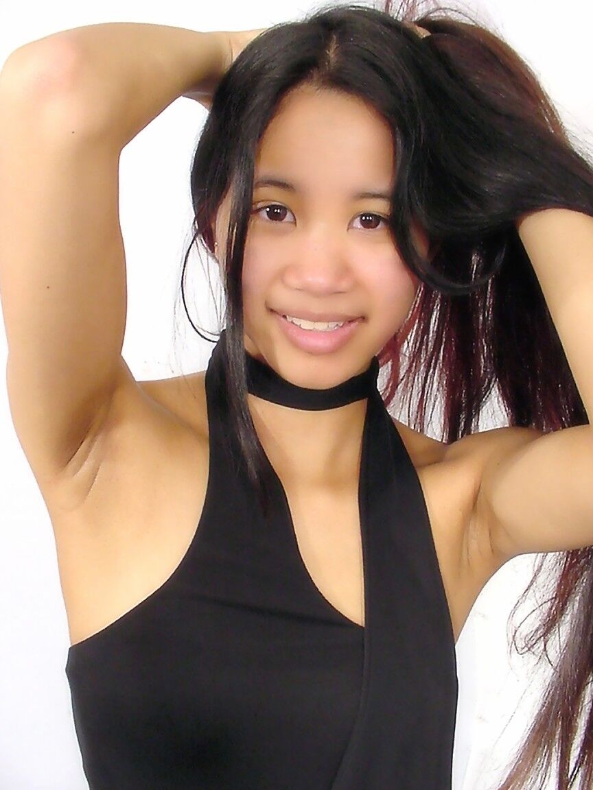 12P 18 year old Asian girl shows off her oil slicked ass and twat at the same time
