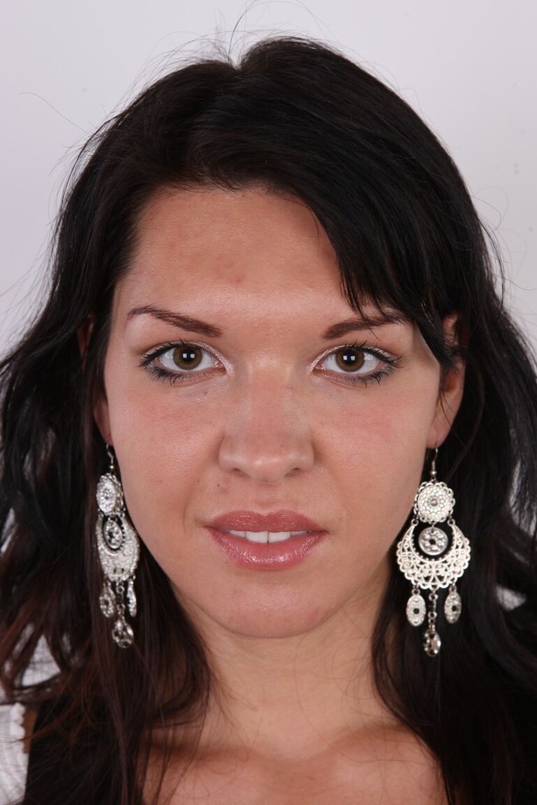 15P Brunette girl Veronika sits on a stool after getting naked for the first time