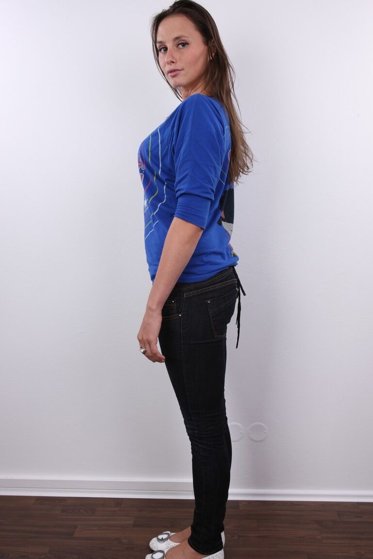 20P First timer Veronika stands fully clothed before getting bare naked