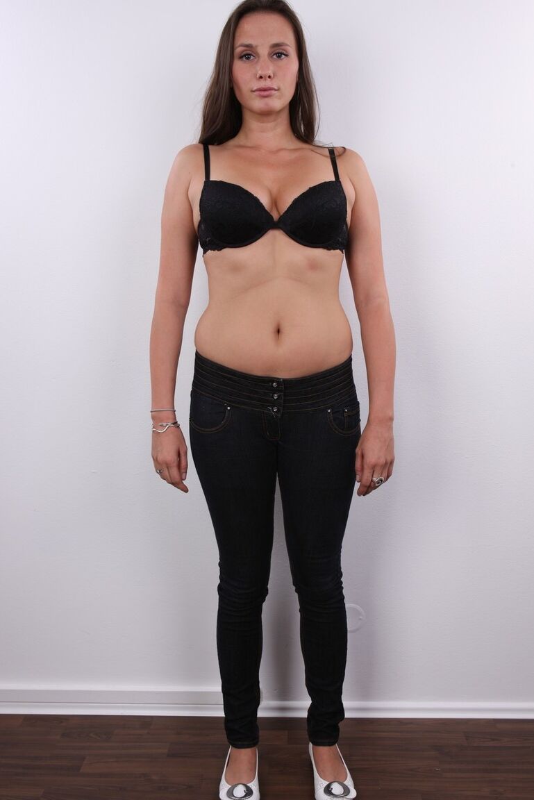 20P First timer Veronika stands fully clothed before getting bare naked