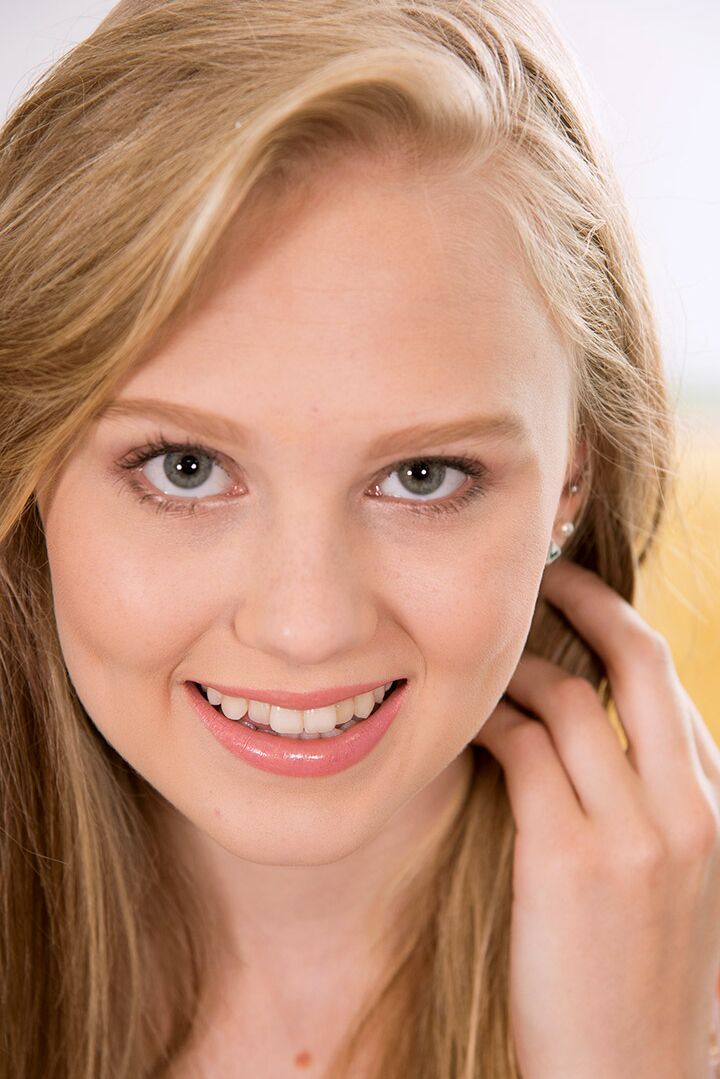 16P Tiny teen girl Lily Rader stripping down to thong underwear and socks on bed