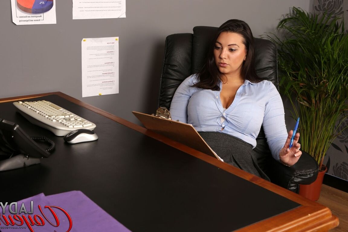 21P Big-boobed secretary Sophie Parker teasing in stockings in the office