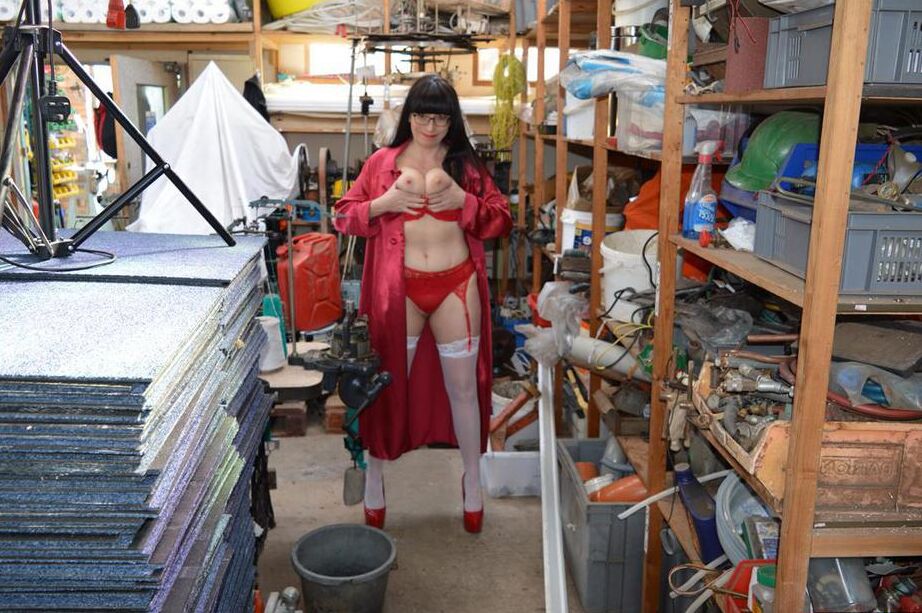 20P Brunette amateur Barby Slut strips to her nylons and heels while in a workshop