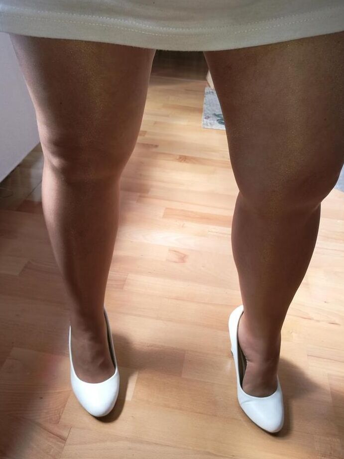 20P Horny grandmother slides hands down pantyhose to masturbate