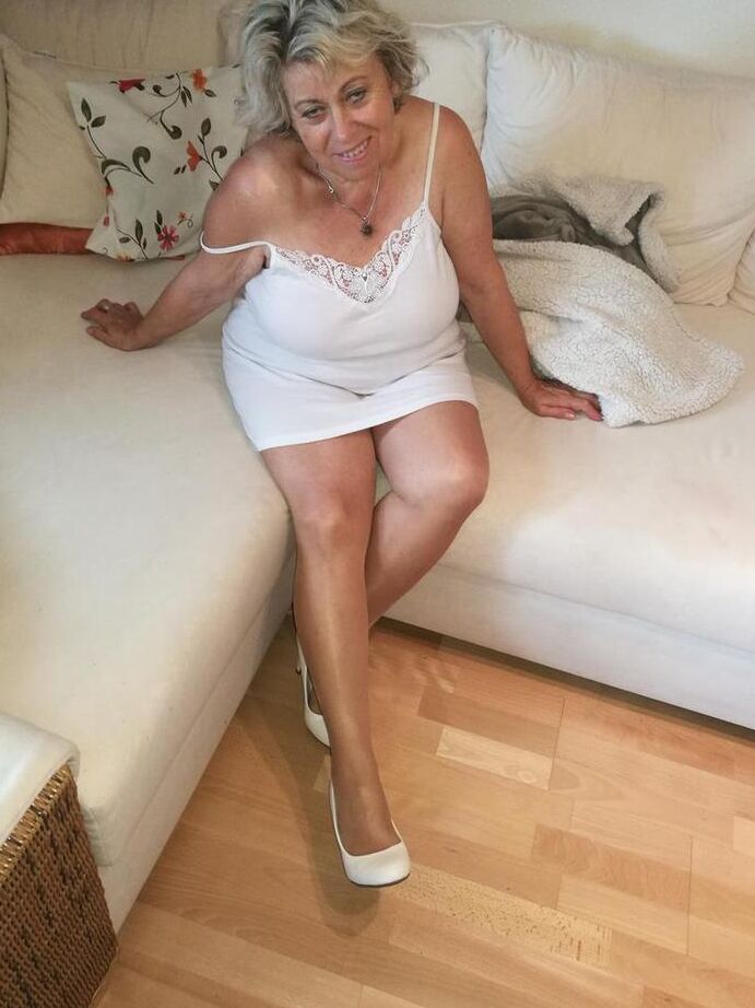 20P Horny grandmother slides hands down pantyhose to masturbate