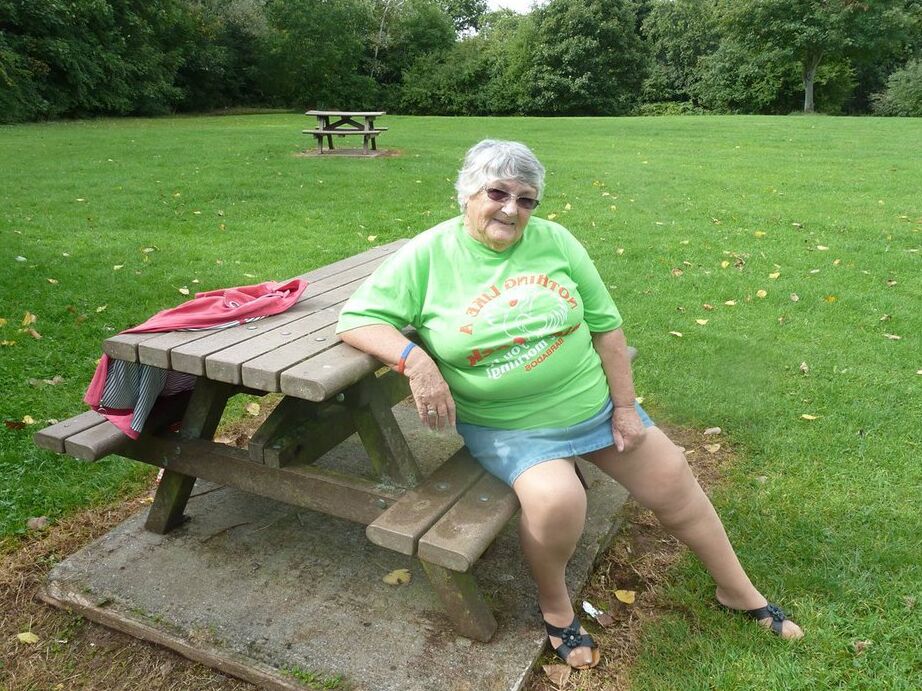 20P Obese oma Grandma Libby exposes her large tits and butt on a picnic table