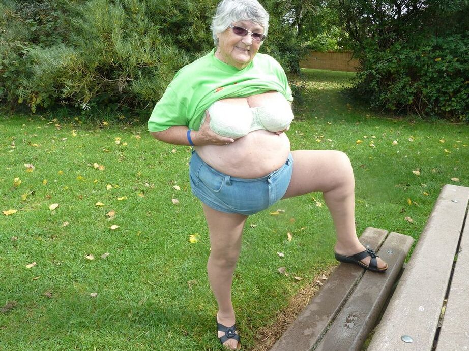 20P Obese oma Grandma Libby exposes her large tits and butt on a picnic table