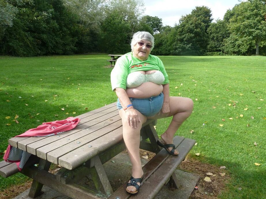 20P Obese oma Grandma Libby exposes her large tits and butt on a picnic table
