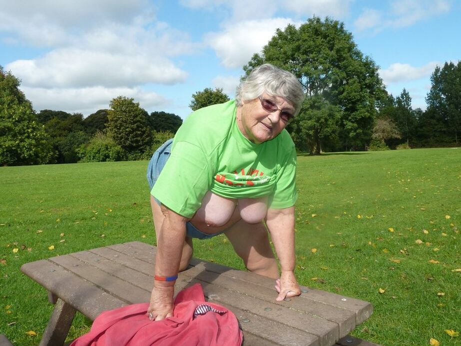 20P Obese oma Grandma Libby exposes her large tits and butt on a picnic table