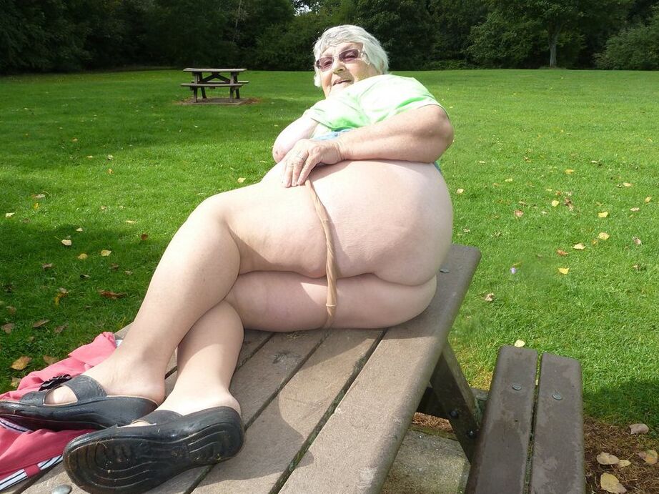20P Obese oma Grandma Libby exposes her large tits and butt on a picnic table