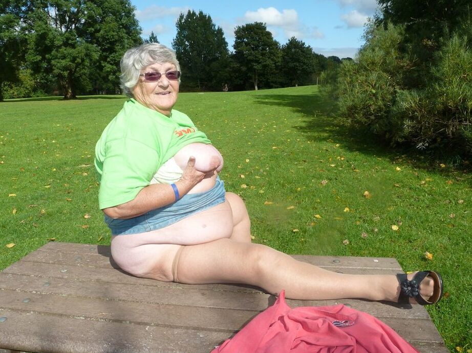 20P Obese oma Grandma Libby exposes her large tits and butt on a picnic table
