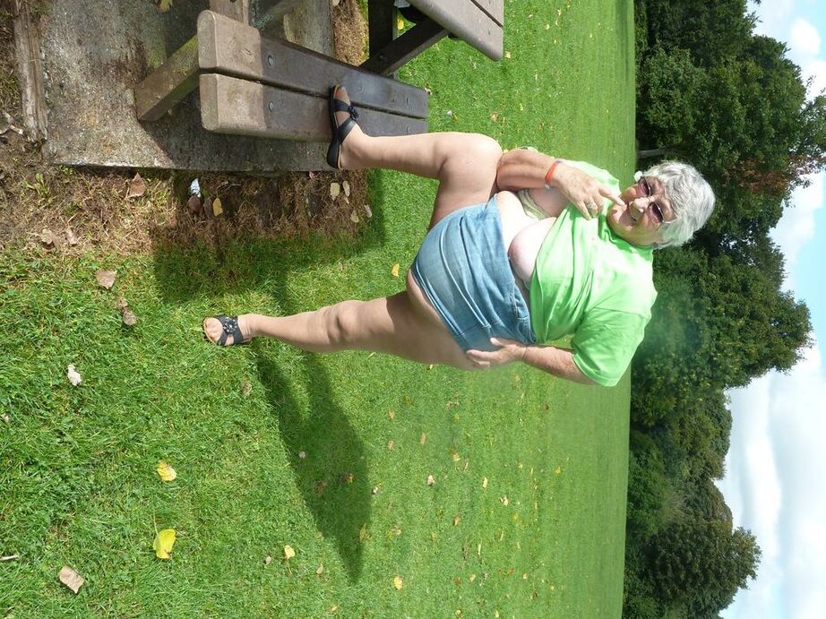 20P Obese oma Grandma Libby exposes her large tits and butt on a picnic table