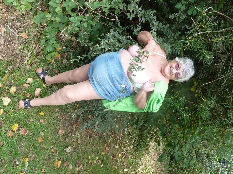 20P Obese oma Grandma Libby exposes her large tits and butt on a picnic table