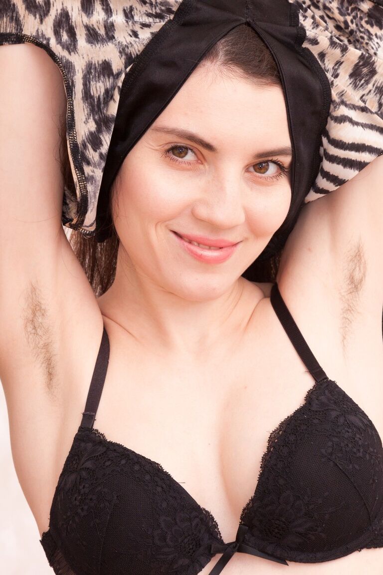 21P Amateur Maia flaunts her tiny tits and & hairy armpits before rubbing her bush
