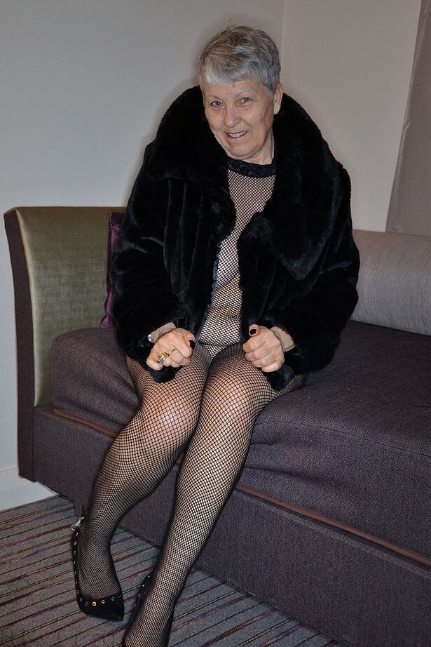 20P Older first timer finger fucks her granny pussy in crotchless bodystocking