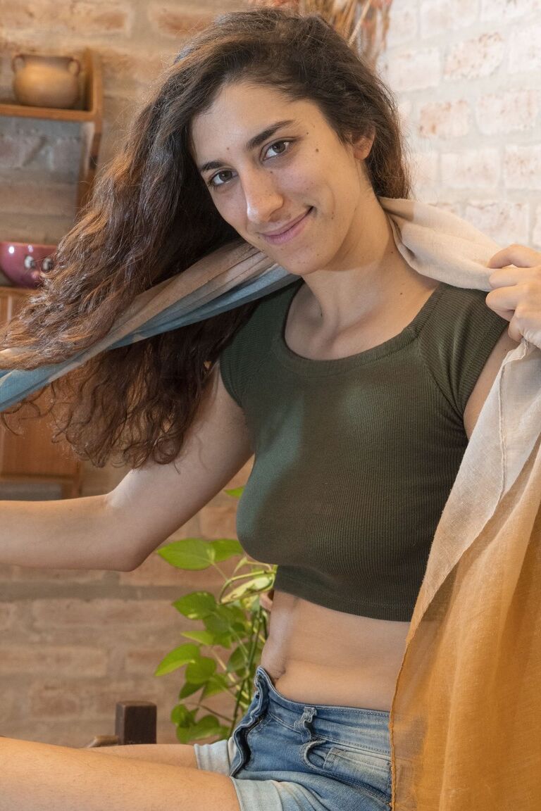 21P Cute hippie Sofia H displaying her furry vagina on the wooden desk