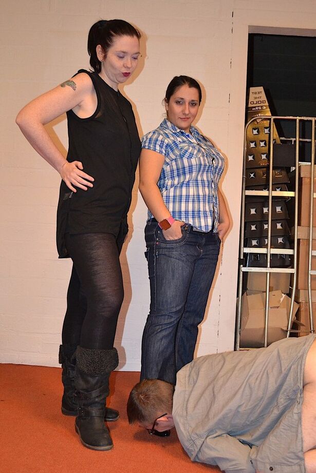 20P Clothed females whip and spank a naked man's ass after he worships their boots