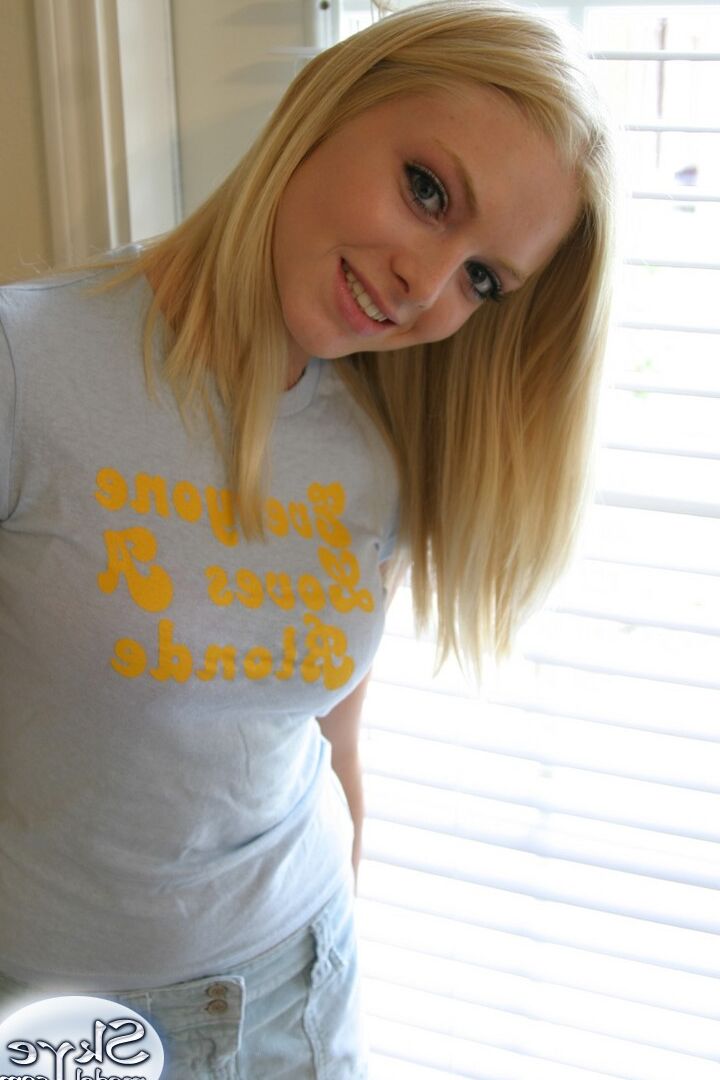 12P Blonde amateur Skye Model models by herself in a short skirt