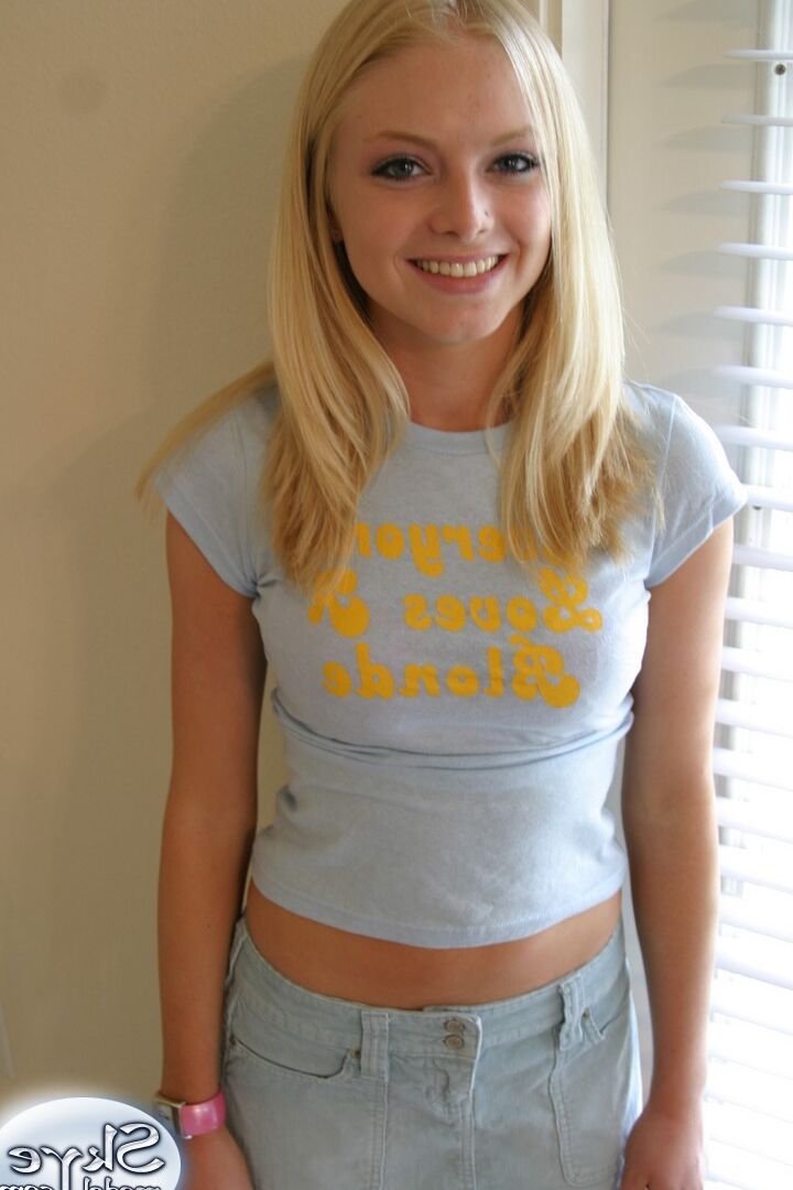 12P Blonde amateur Skye Model models by herself in a short skirt