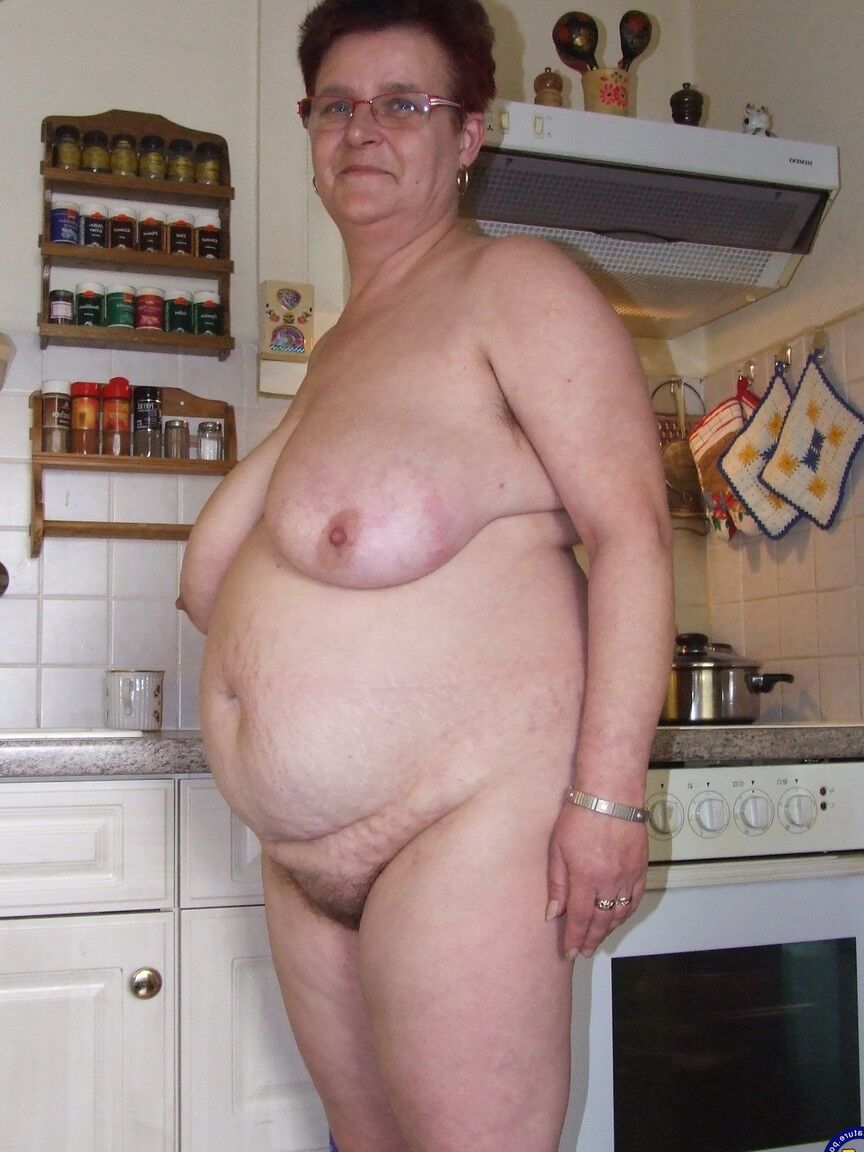 21P Old grandma Ingeborg exposes her fat body and sticks a vacuum pipe in her twat