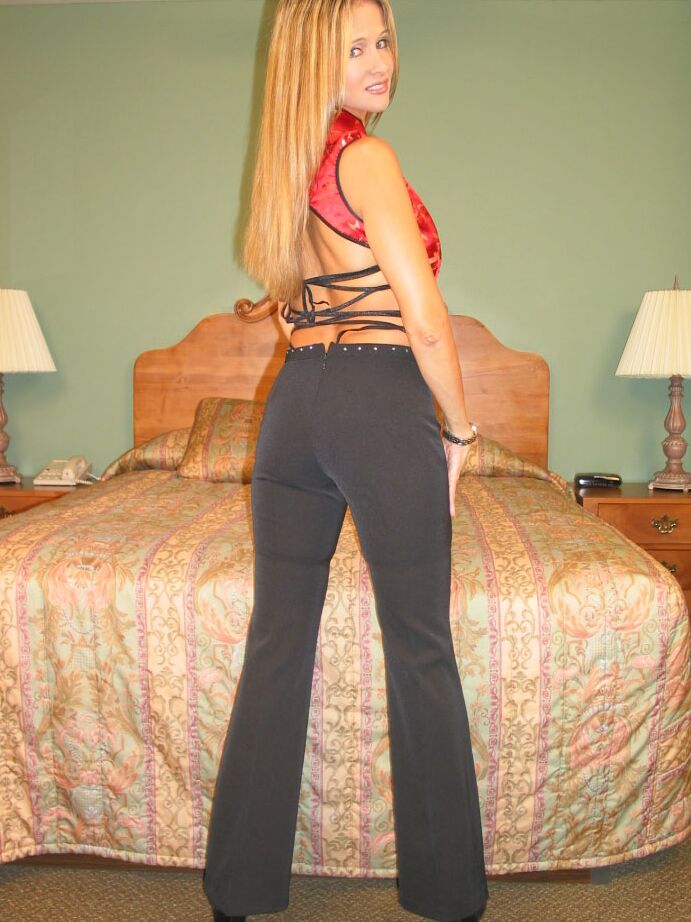 15P Latina amateur slides her bodysuit aside while wearing stockings and heels