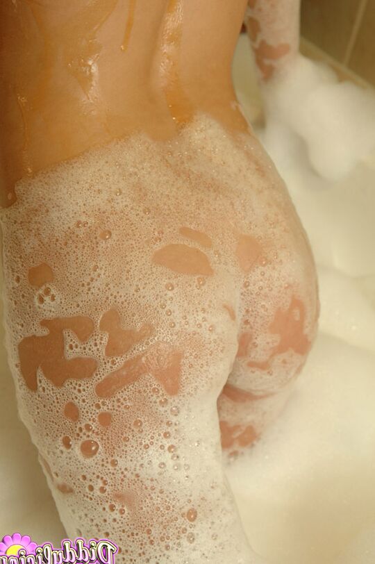 12P Flat chested Diddylicious sheds her bikini in the bath showing soapy hot ass