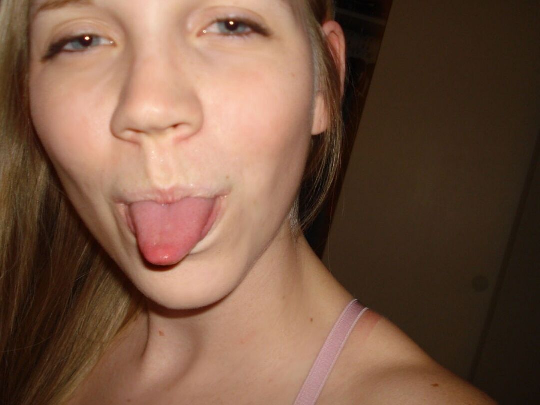 15P Cute amateur Taylor True hams it up while taking revealing self shots